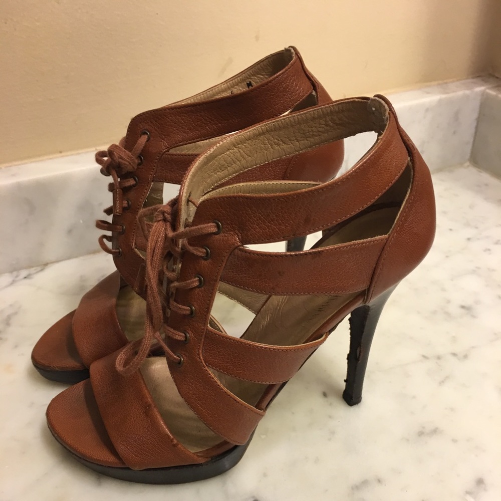 Stuart Weitzman lace up heels.